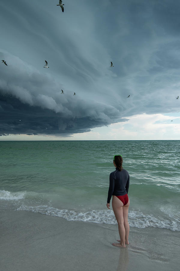 Beach Storm Watch Photograph by Carolyn Hutchins