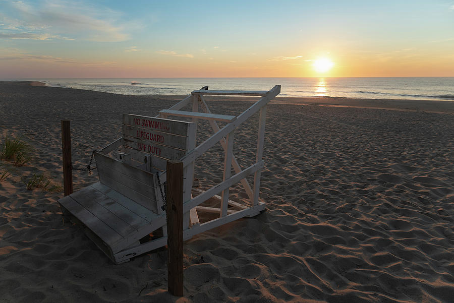 Beach Sunrise with Lifeguard Chair on the Jersey Shore Photograph by Matthew DeGrushe