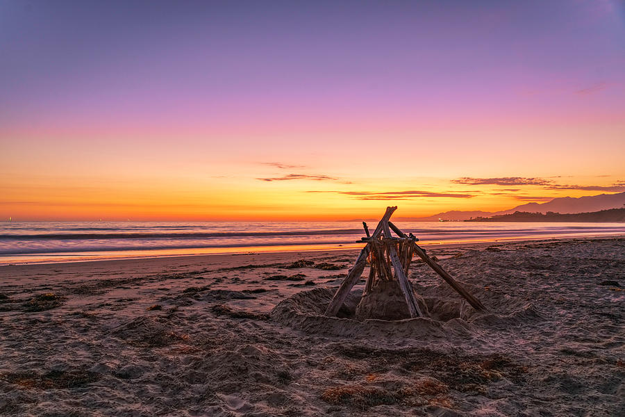 Beach Sunset Over Driftwood Sculpture Photograph by Lindsay Thomson