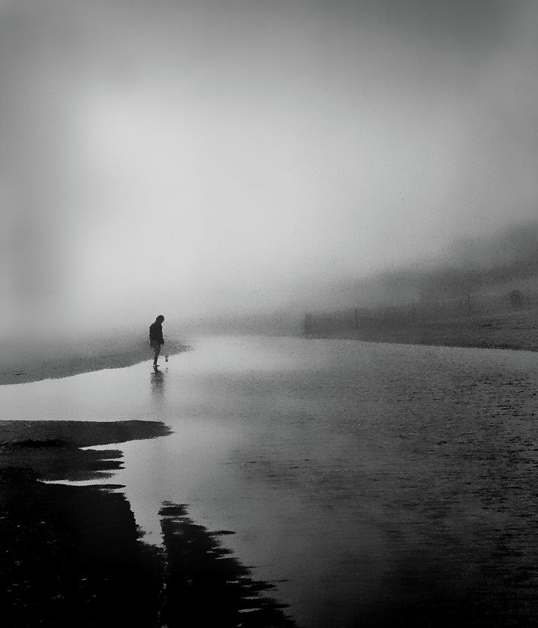 Beachcomber, foggy day. Delaware shore Photograph by Bill Jonscher