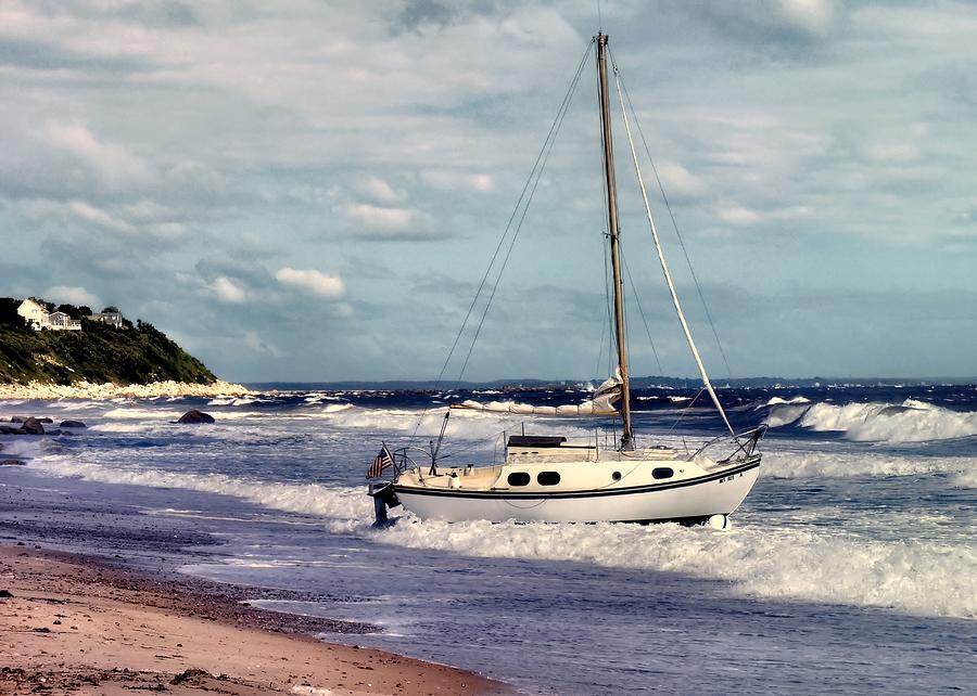 Beached sailboat Photograph by Janice Drew