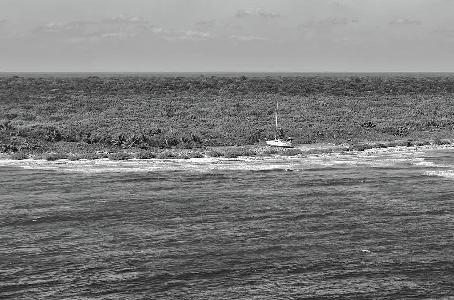 Beached Sailboat on the Coast of a Prisitne Undeveloped Region of Cozumel Mexico Black and White Photograph by Shawn OBrien