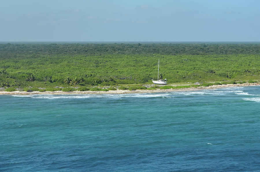 Beached Sailboat on the Coast of a Prisitne Undeveloped Region of Cozumel Mexico Photograph by Shawn OBrien