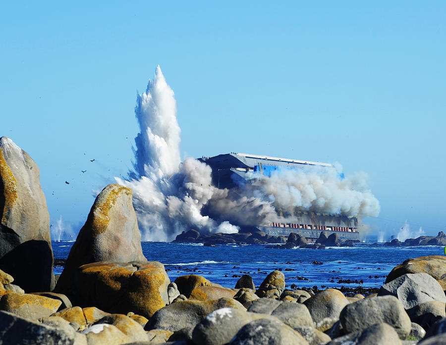 Beached ship explodes at sea Photograph by Brazzo