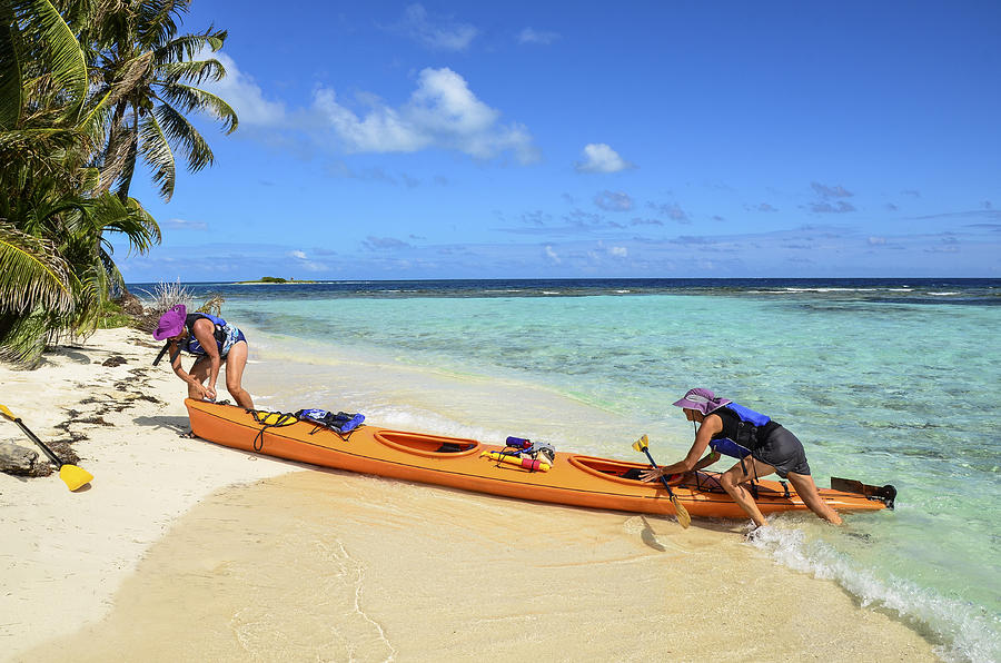 Beaching kayak Photograph by CampPhoto
