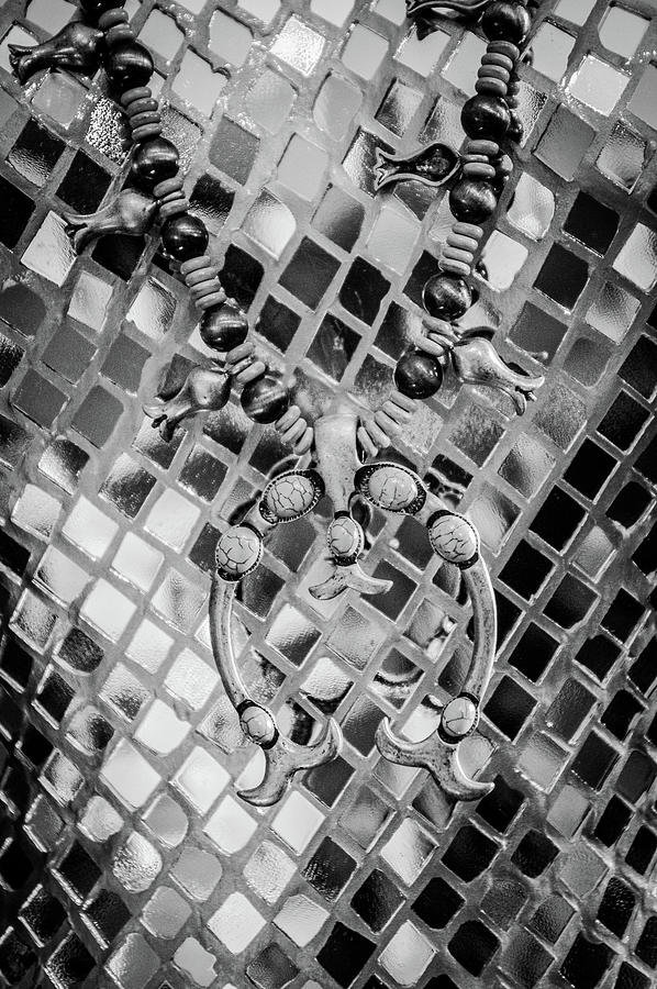 Beaded Necklace and Medallion Against Glass Mosaic black and white Photograph by Mary Tastad Beaded Necklace and Medallion Against Glass Mosaic black and white Photograph by Mary Tastad
