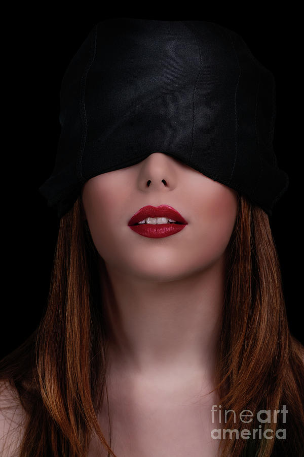 Beautiful blindfolded woman with red lipstick by Mendelex Photography