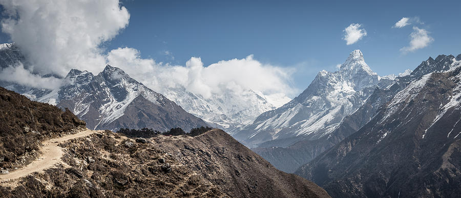 Beautiful dusty winding path with Mount Everest in the background, and deep valleys Photograph by Alan Currie