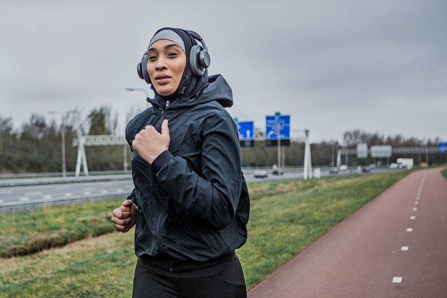 Beautiful Female Athlete wearing a sports hijab Photograph by Lorado