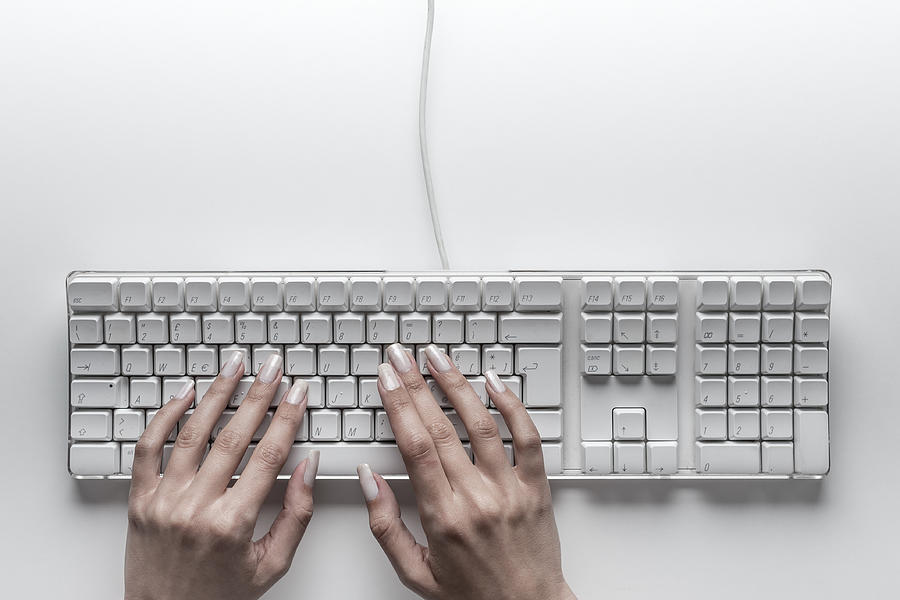 Beautiful girl hands typing on computer keyboard Photograph by Paolomartinezphotography