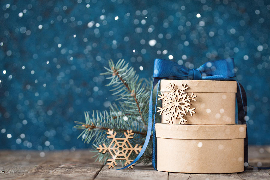 Beautiful holiday decorated background with christmas gift boxes ,fir. christmas holiday concept Photograph by Id-art