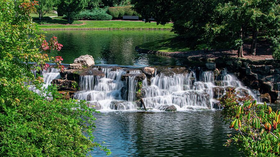 Manmade waterfall and pond Photograph by Mike Worley