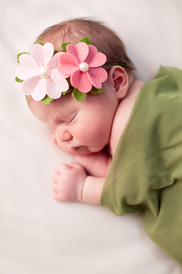 Beautiful Newborn Baby Girl Swaddled in Soft, Green Blanket Photograph by Ideabug