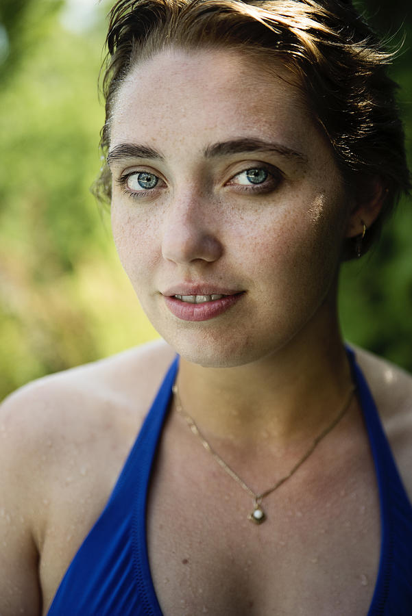 Beautiful portrait of young woman in summer nature. Photograph by Martinedoucet