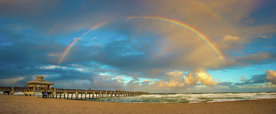 Beautiful Rainbow Over Juno Beach Pier Florida Photograph by Kim Seng