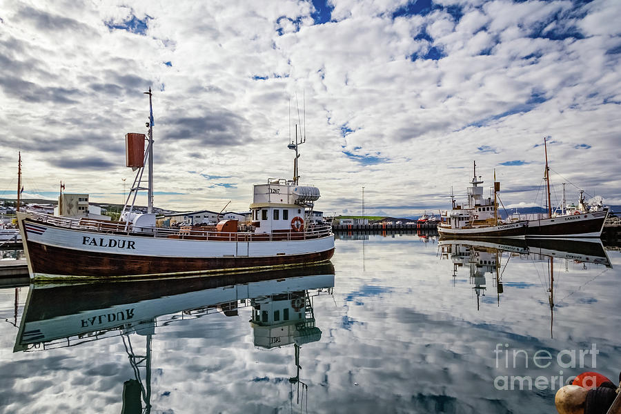 Beautiful reflection in Husavik harbor, Iceland Photograph by Lyl Dil Creations