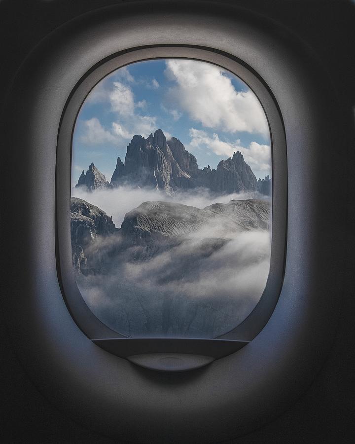Nature Digital Art - Beautiful shot of mountains and a cloudy sky from the inside of plane windows by Celestial Images