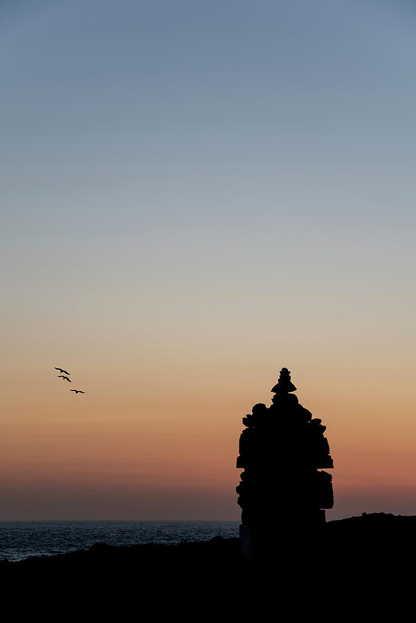 Beautiful Silhouette Landscape Image Of Zen Rock Pile Against Vi Photograph