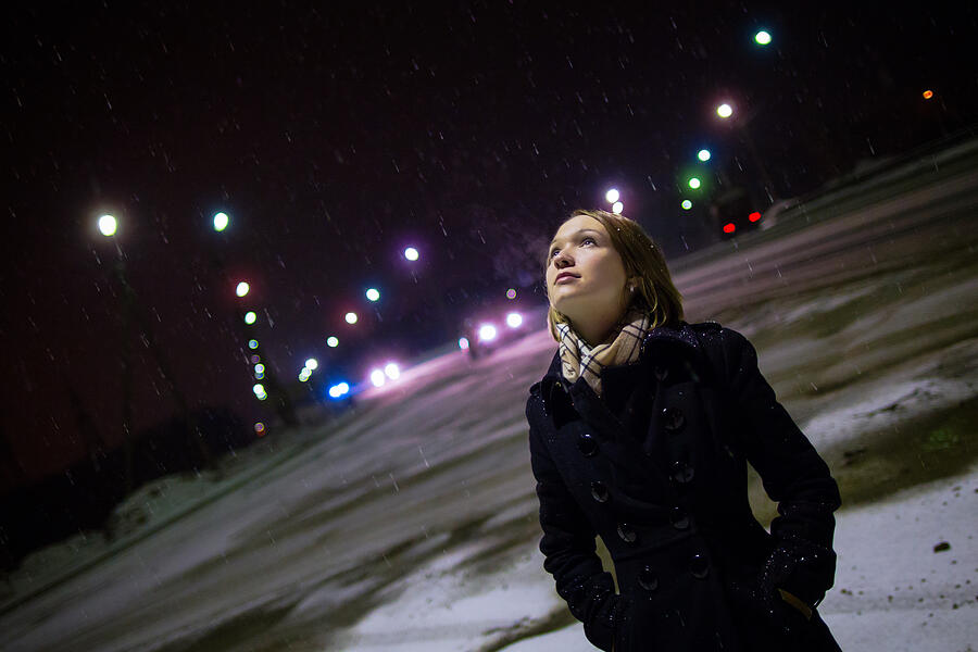 Beautiful single girl at night in the snow Photograph by _ib_