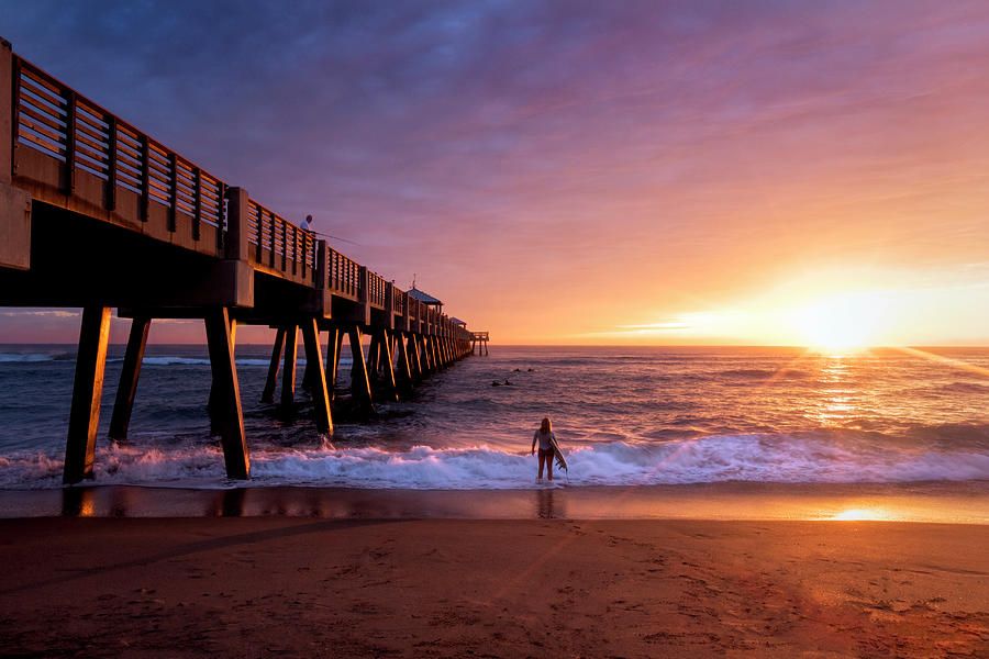 Beautiful Sunrays Surfer at the Pier Photograph by Debra and Dave Vanderlaan