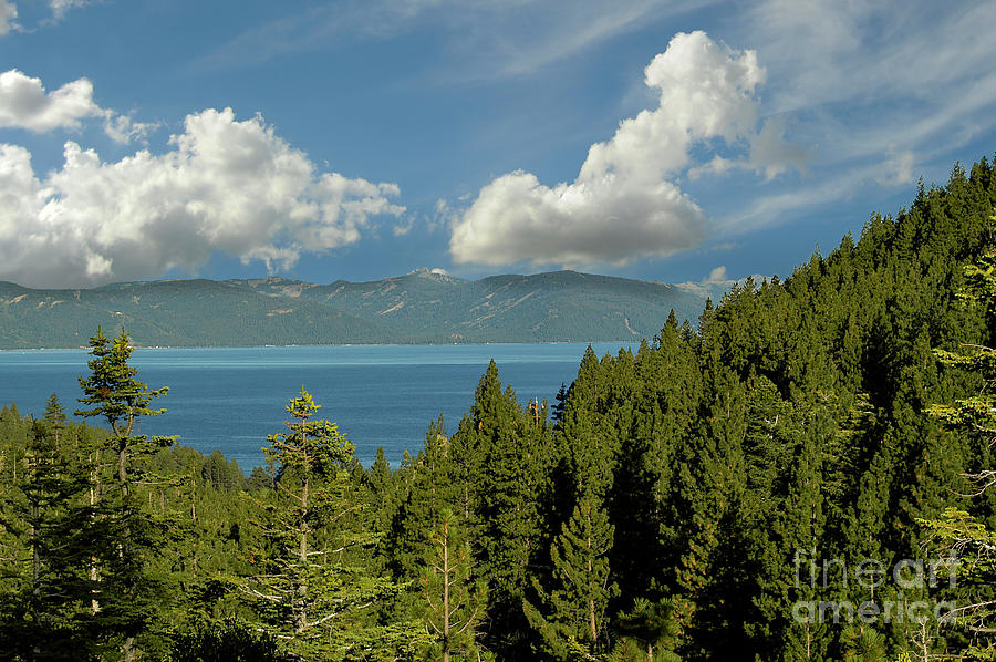  Beautiful white clouds hovering over Lake Tahoe on the California and Nevada border. Photograph by Gunther Allen