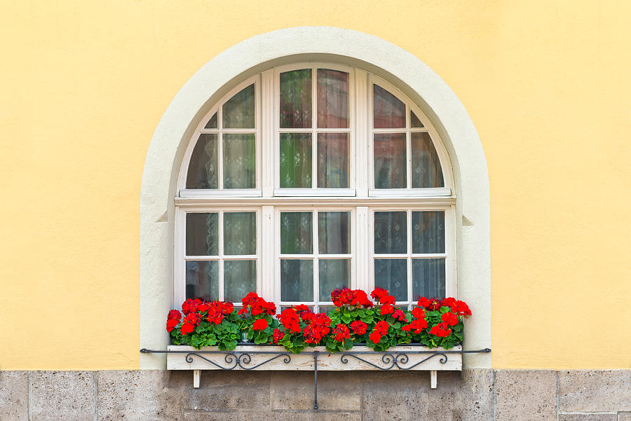 Beautiful Window with flowers from Bavaria Photograph by Syolacan