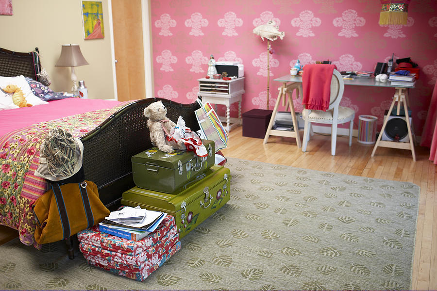 Bed room with toys and study table Photograph by Jen Siska