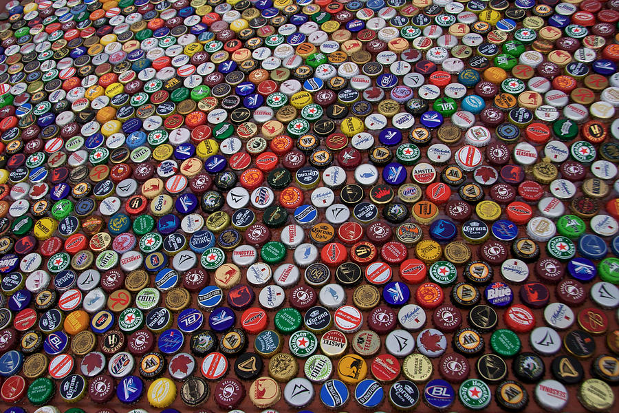 Beer bottle caps Photograph by C. Chase Taylor