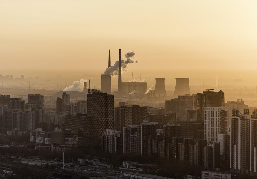 Beijing, factory with smoke coming out of chimneys Photograph by Martin Puddy