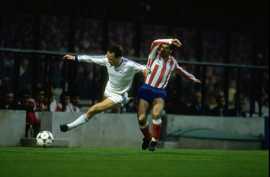 Belanov of Dynamo Kiev is tackled by Prieto of Atletico Madrid Photograph by David Cannon