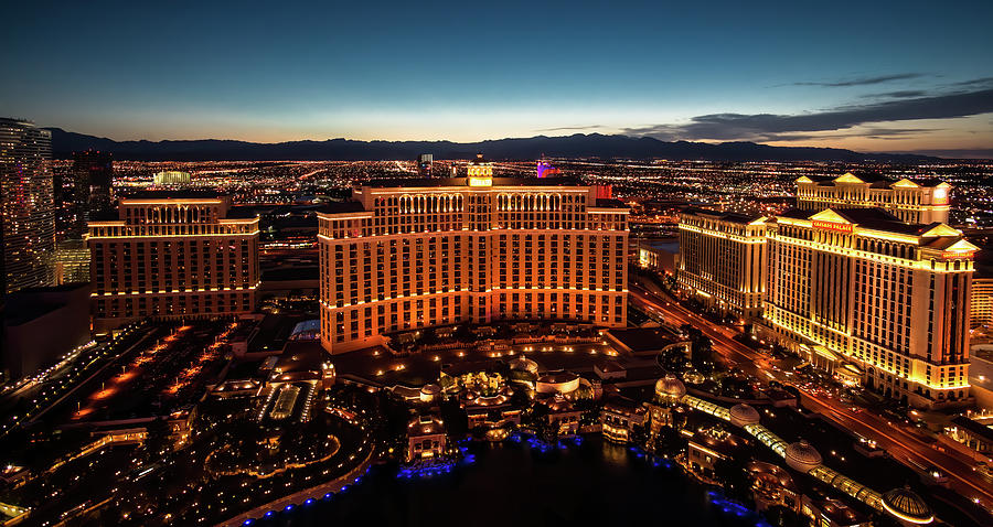 Bellagio, Caesar Palace at night high angle photography Photograph by Jean-Luc Farges