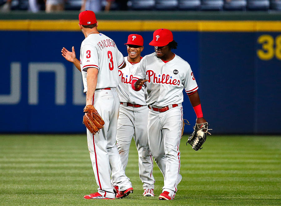 Ben Revere, Odubel Herrera, and Jeff Francoeur Photograph by Kevin C. Cox
