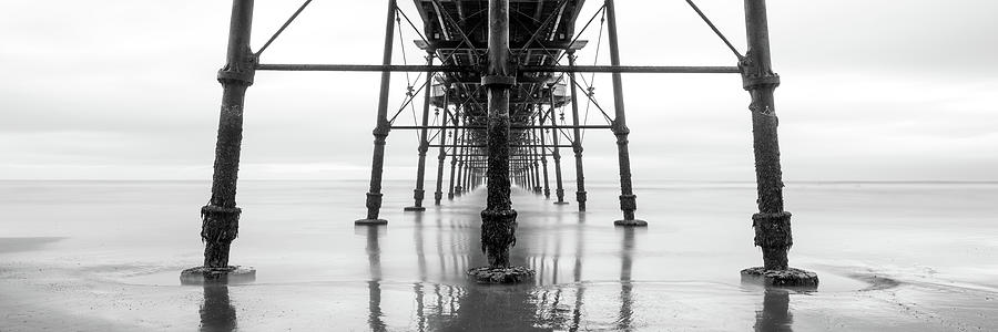Beneath Saltburn Pier Redcar and cleveland Black and white Photograph by Sonny Ryse