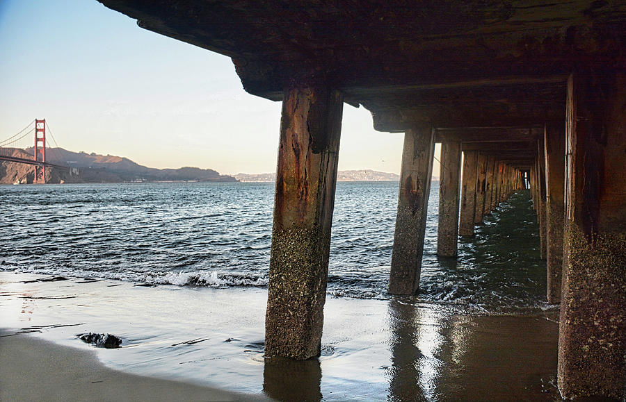 Beneath the Wharf and a view of the Golden Gate Photograph by Maggy Marsh