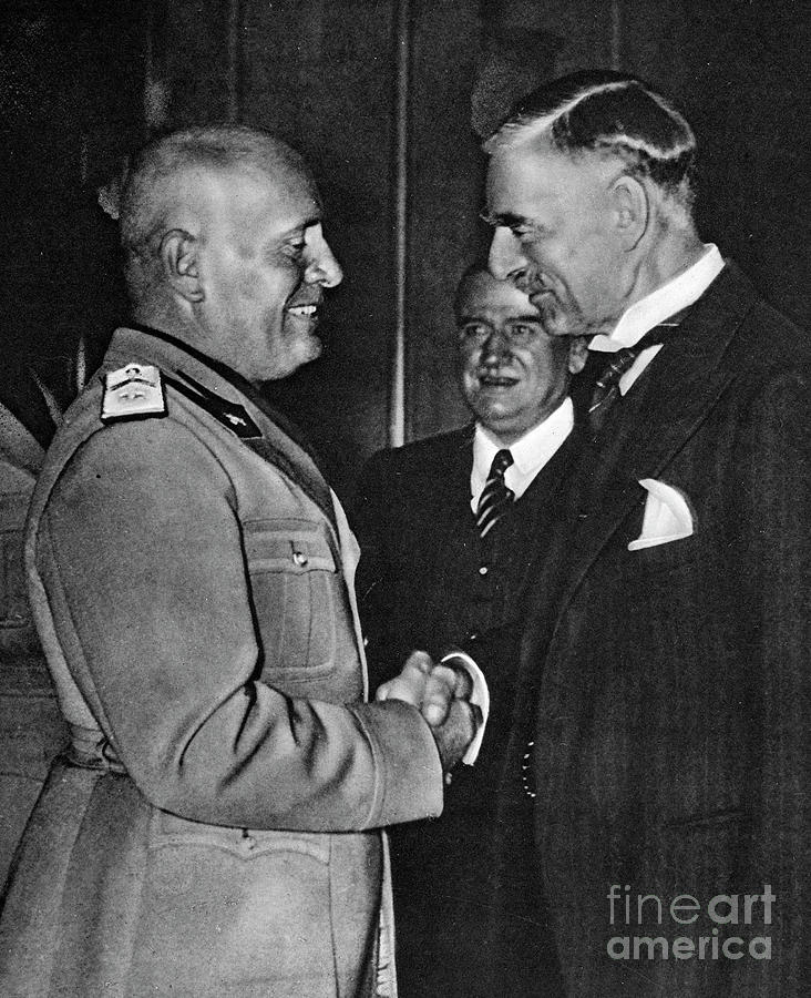 Benito Mussolini and Neville Chamberlain, 1938 Photograph by Granger