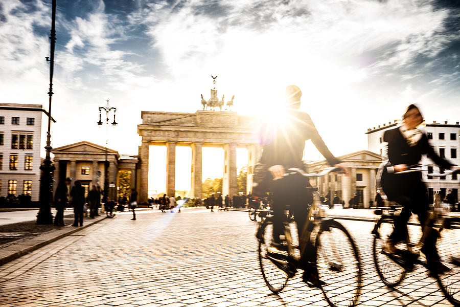 Berlin - People cycling at Brandenburg Gate Photograph by LeoPatrizi