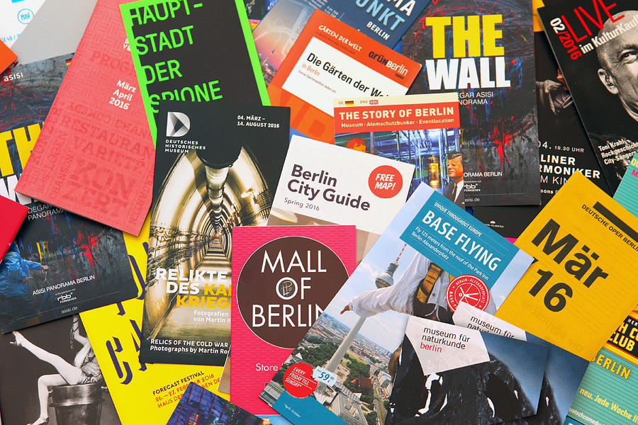 Berlin tourist flyers, leaflets and advertisements to local events Photograph by Maxiphoto