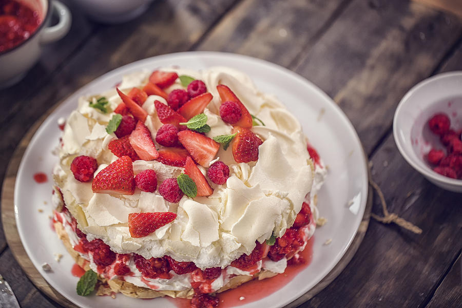 Berry Pavlova Cake with Strawberries and Raspberries Photograph by GMVozd
