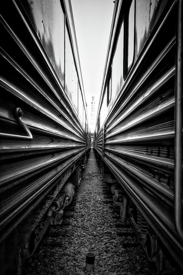 Between the Trains Photograph by Randall Allen