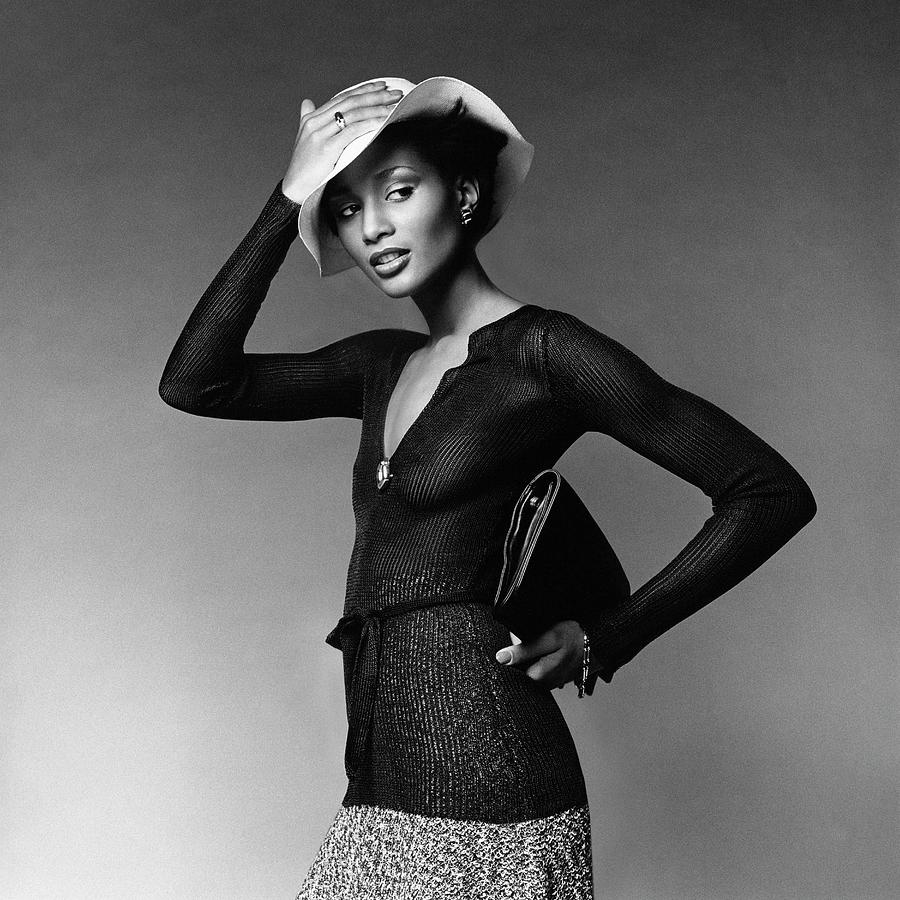 Beverly Johnson Wearing A Sheer Ribbed Pullove Photograph by Francesco Scavullo