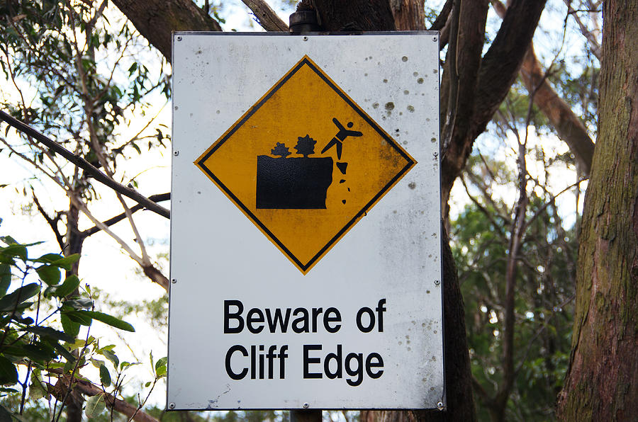 Beware of cliff edge sign Photograph by Simon McGill