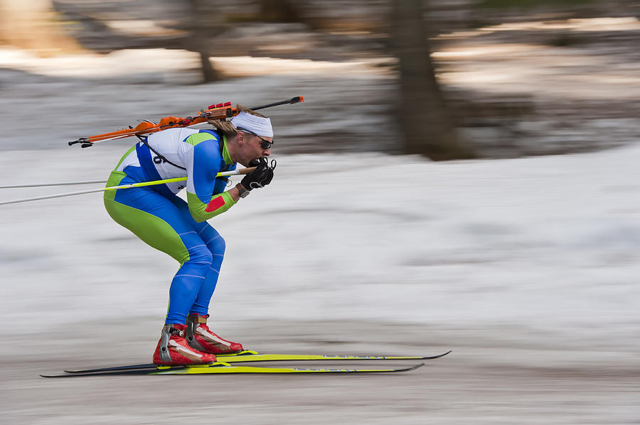 Biathlon competitor at downhill Photograph by Technotr