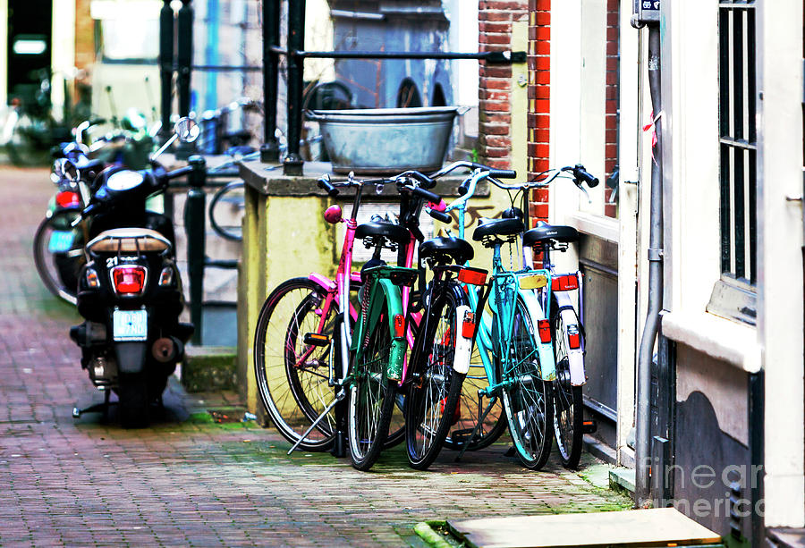 Bicycles in Amsterdam Photograph by John Rizzuto