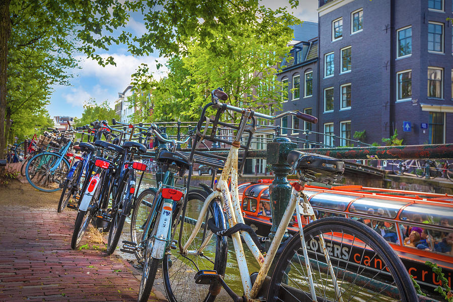 Bicycles of Every Color in Amsterdam Photograph by Debra and Dave Vanderlaan