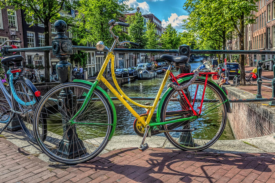 Bicycles on the Canals Photograph by Debra and Dave Vanderlaan