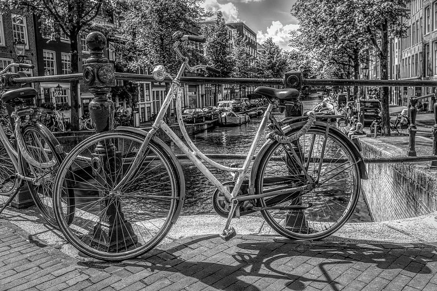 Bicycles on the Canals in Black and White Photograph by Debra and Dave Vanderlaan