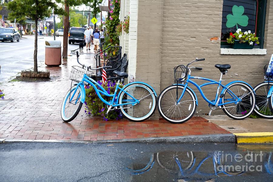Bicycles parked along the main street in Saint Michaels Maryland USA Photograph by William Kuta