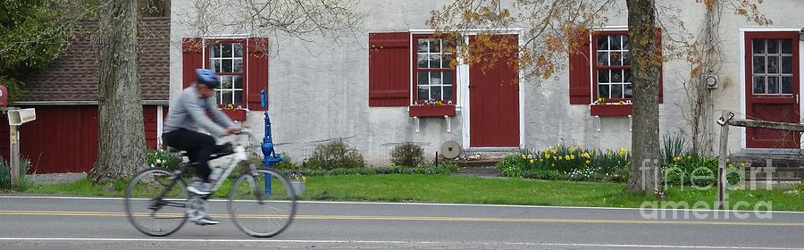 Bicycling Past Farmhouse Wide Photograph