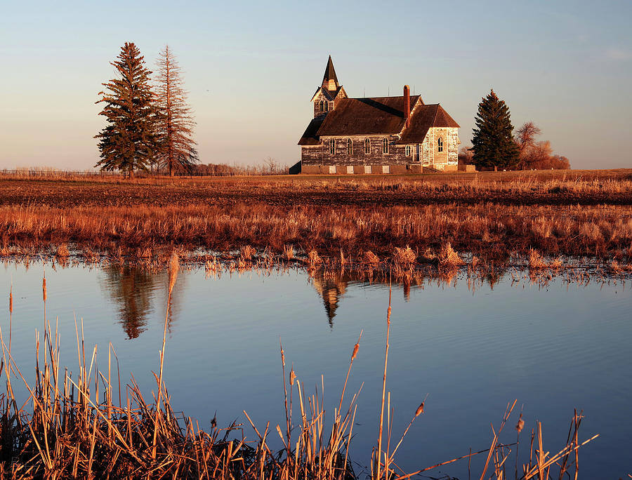Big Coulee Lutheran Church at sunset with pond Photograph by Peter Herman