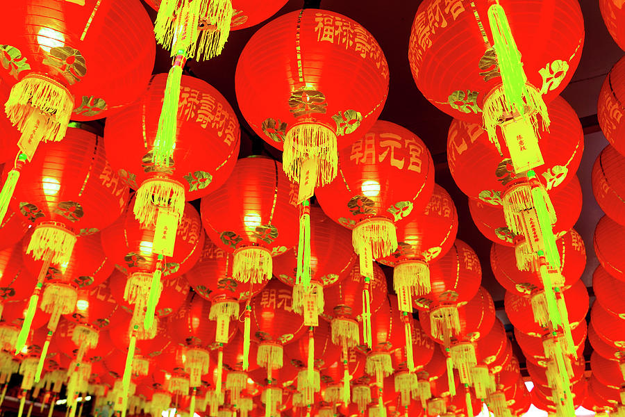 Big group of Chinese red lantern hanging at a roof for decoration ...